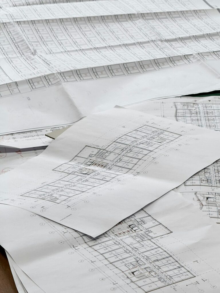 Architectural blueprints spread out during project planning